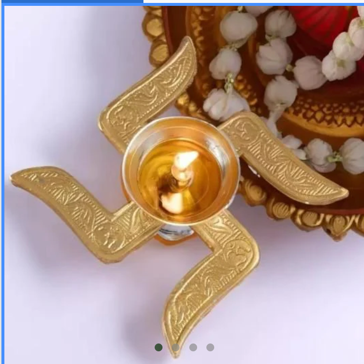 brass swastik diya